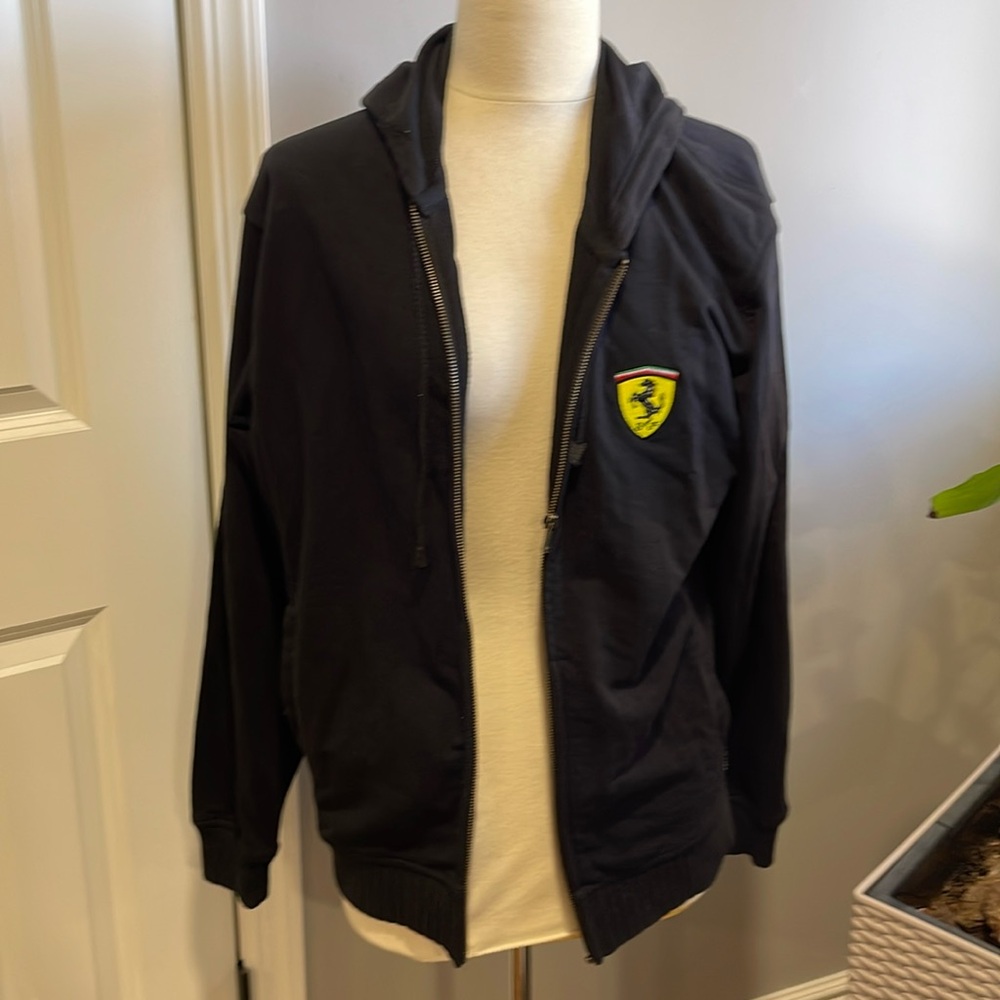 Ferrari 
Official Licensed Product Hoodie in size small.